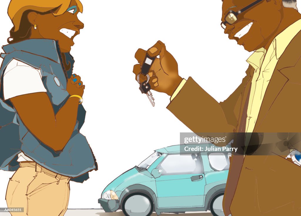 Father giving daughter car keys