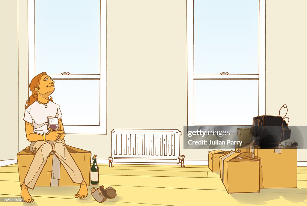 Woman moving in apartment