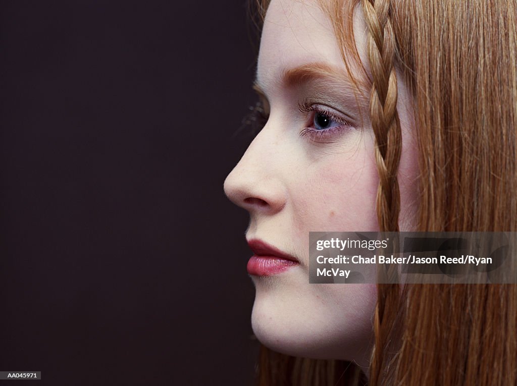 Teenage girl (13-15), profile, close-up