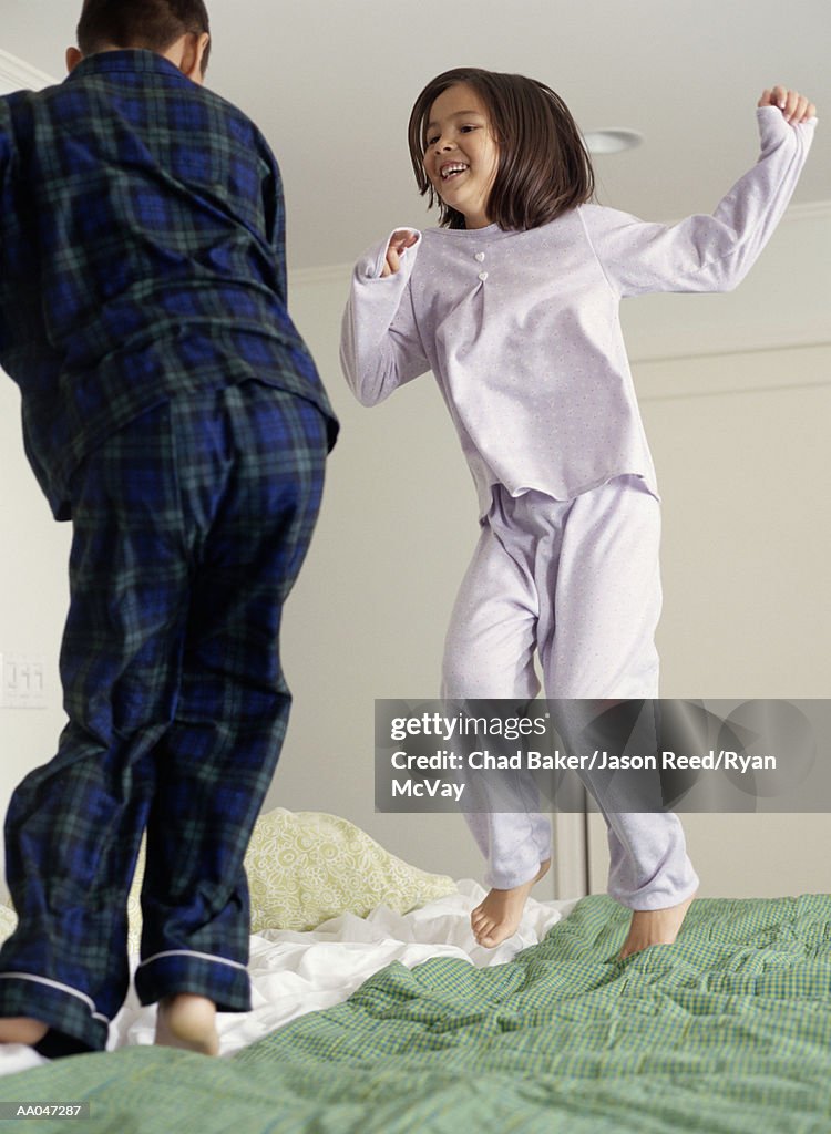 Kids Jumping on Bed