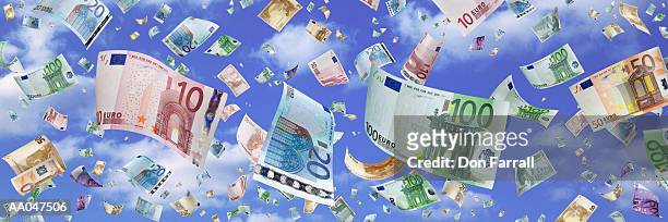euro notes falling from sky (digital composite) - cash falling stock pictures, royalty-free photos & images