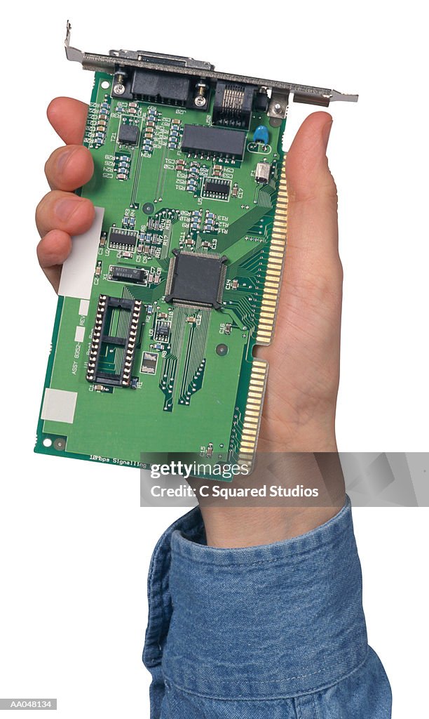 Man holding circuit board