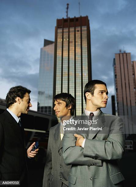 group of businessmen - young urban professional person stock-fotos und bilder