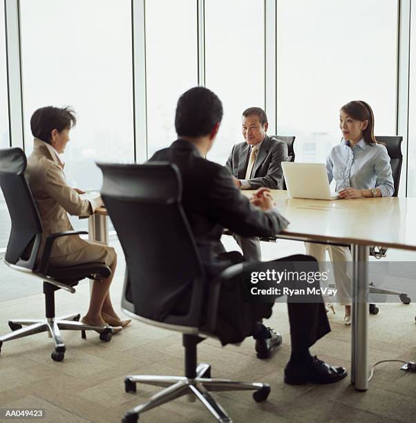 business people meeting in conference room - worldwide day of play and the carmelo anthony foundation san juan puerto rico stockfoto's en -beelden