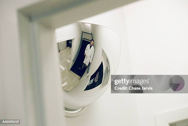 reflection of laboratory technician - convex stock pictures, royalty-free photos & images