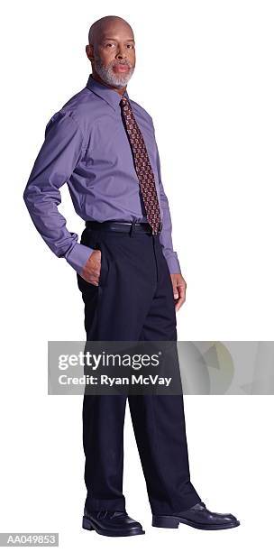 mature man with hand in pocket - buisnessman studio clipping path bildbanksfoton och bilder