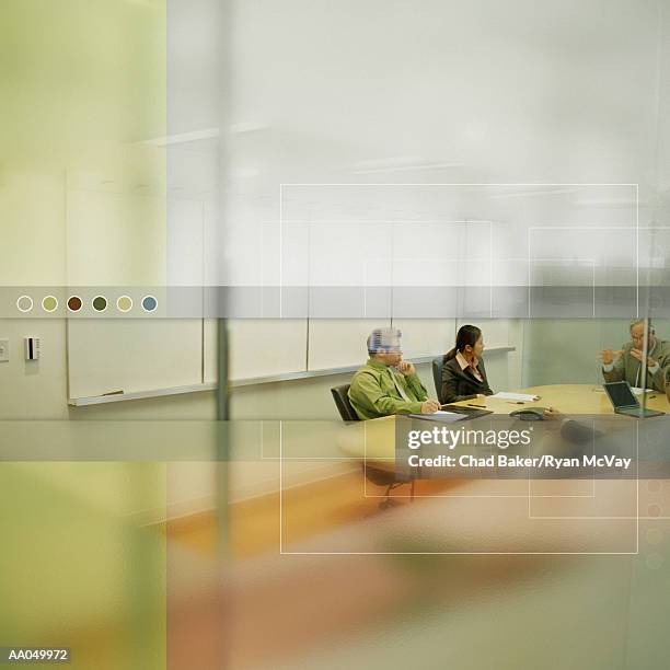 business colleagues at table in conference room, digital composite - key speakers at the international economic forum of the americas conference of montreal stockfoto's en -beelden