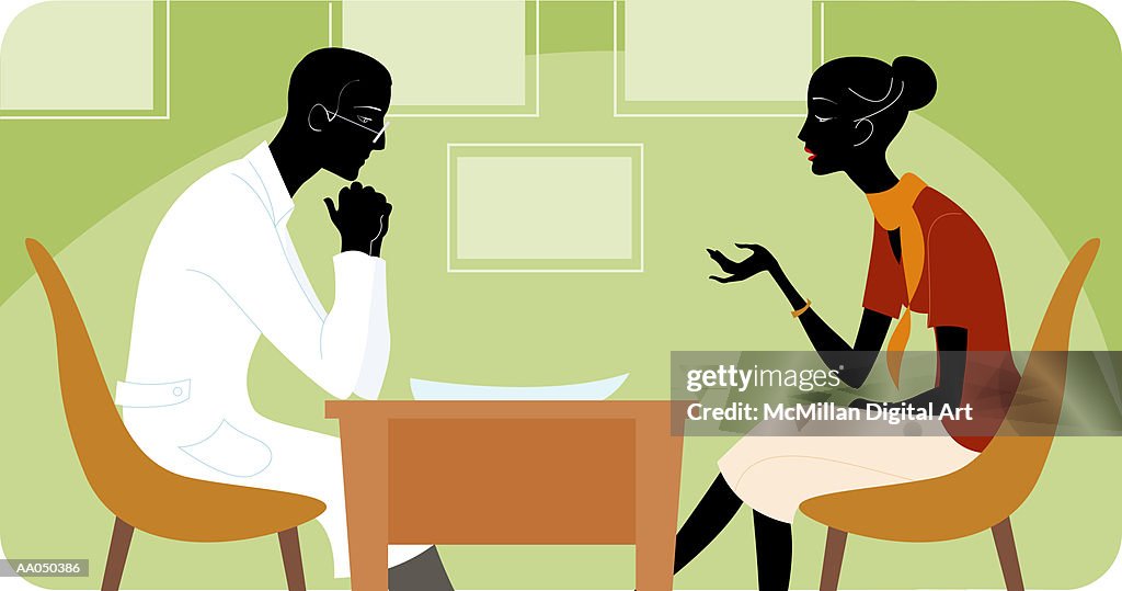 Woman talking to therapist, side view