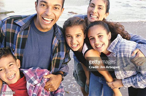 family playing on beach, close-up, california, usa - girl 11 12 laughing close up foto e immagini stock