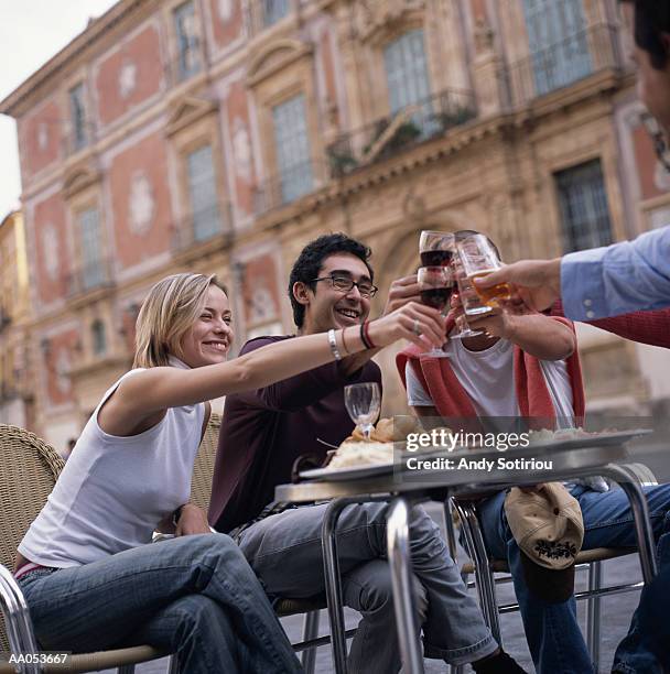 friends toasting with wine glasses - murcia spain stock pictures, royalty-free photos & images