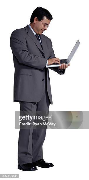 man holding laptop - buisnessman studio clipping path bildbanksfoton och bilder