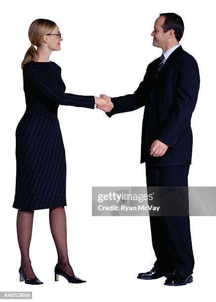 businessman and businesswoman shaking hands - buisnessman studio clipping path bildbanksfoton och bilder