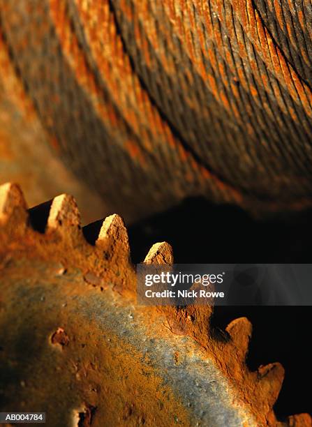 detail of a rusted gear and wire rope - wire rope stock pictures, royalty-free photos & images