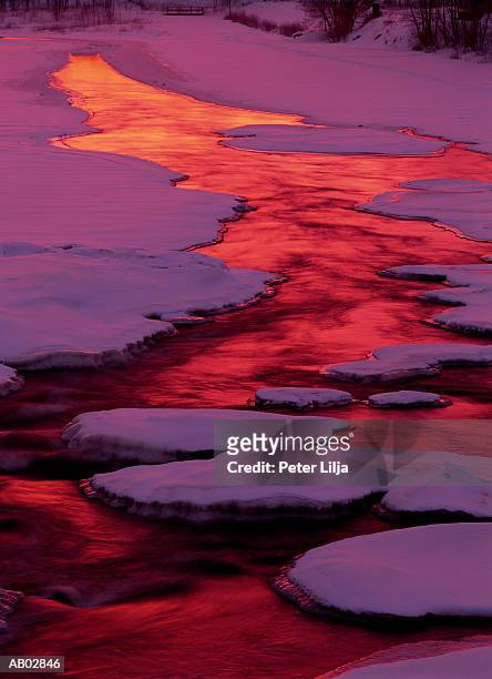 riverbed covered with ice and snow, sunrise, elevated view - peter snow stock pictures, royalty-free photos & images