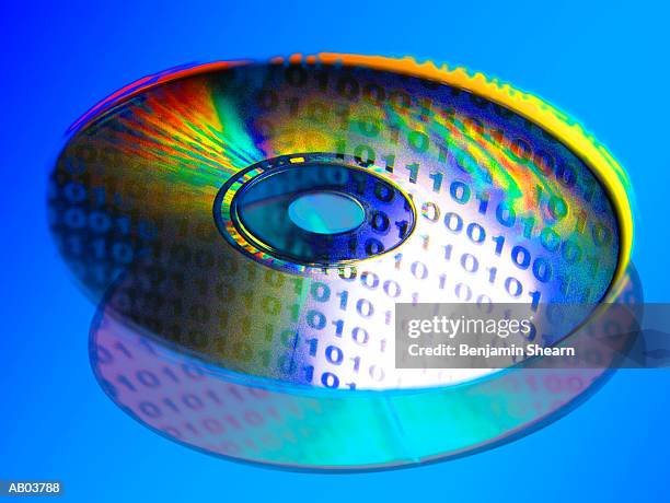 compact disc reflecting binary code (digital enhancement) - benjamin stock-fotos und bilder