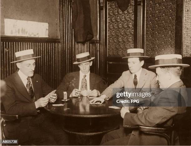four men playing cards (b&w sepia tone) - 20th century stock pictures, royalty-free photos & images