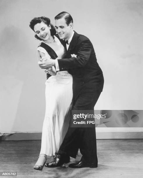 couple in formal wear dancing (b&w) - roaring 20s stock pictures, royalty-free photos & images