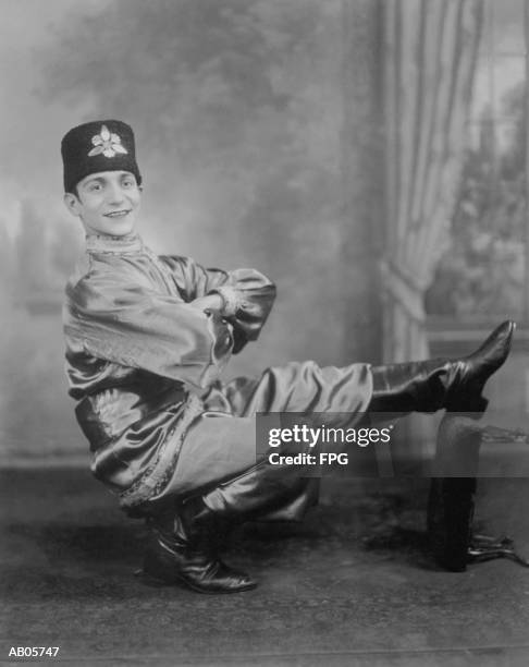 man doing traditional cossack dance, portrait - russian dancer stock pictures, royalty-free photos & images