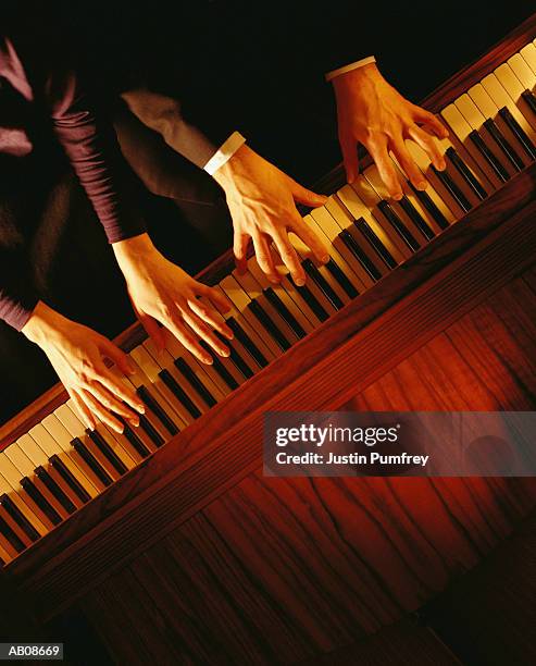 duet on piano - pianist stock pictures, royalty-free photos & images