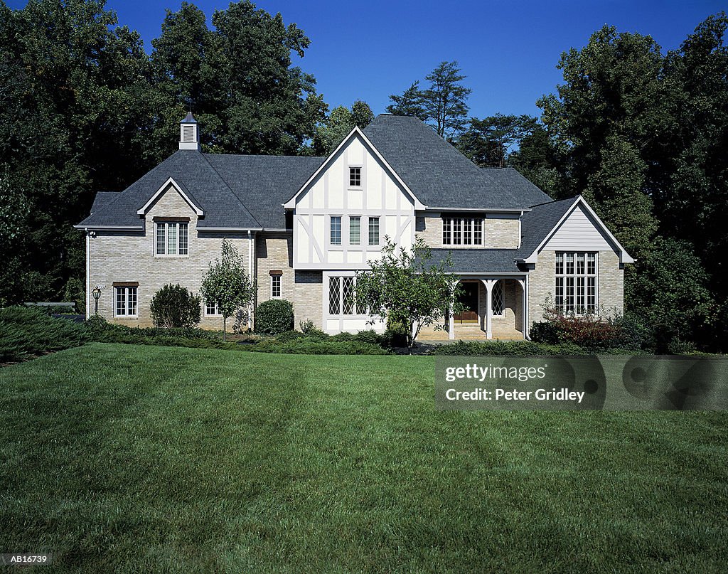 House exterior with surrounding yard