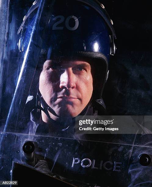 close-up of riot policeman - police in riot gear stock pictures, royalty-free photos & images