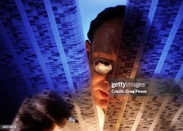 researcher working on dna sequencing, low angle view - greg pease stock-fotos und bilder