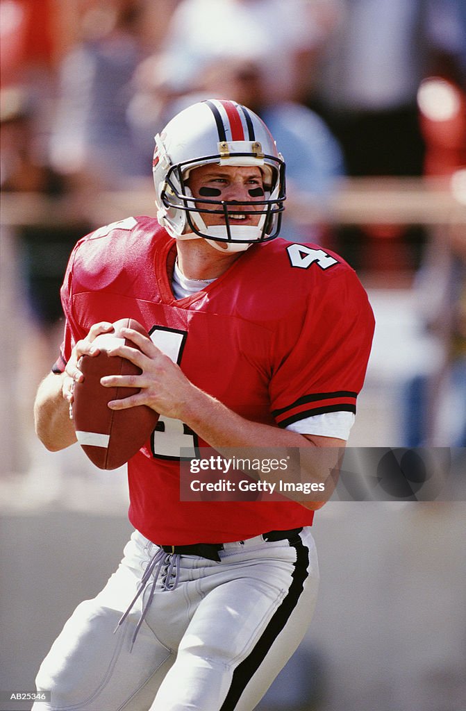 Quarterback ready to make pass in football game