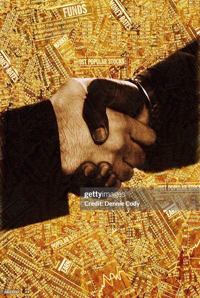 Businessmen shaking hands, close-up and stock data (digital composite)