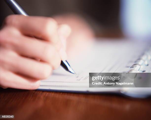 Man Write Check 7,483 2000 Check Stock Photos, High-Res Pictures, and Images - Getty Images