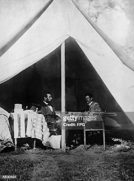 abraham lincoln and george b. mcclellan in tent, 1862 (b&w) - mcclellan stock pictures, royalty-free photos & images