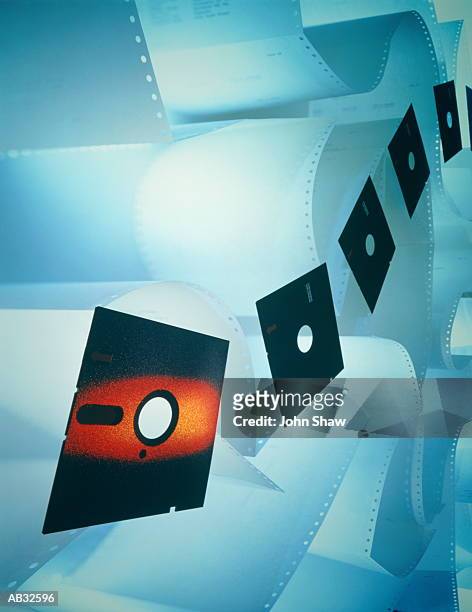 computer discs and paper - shaw stock pictures, royalty-free photos & images