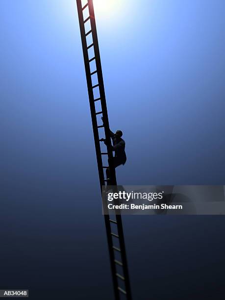 businessman climbing ladder - benjamin stock-fotos und bilder