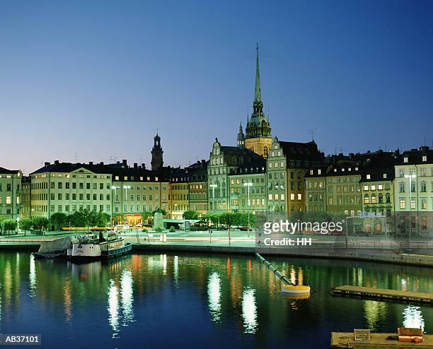 sweden, stockholm, buildings along waterfront - provinz stockholms län stock-fotos und bilder