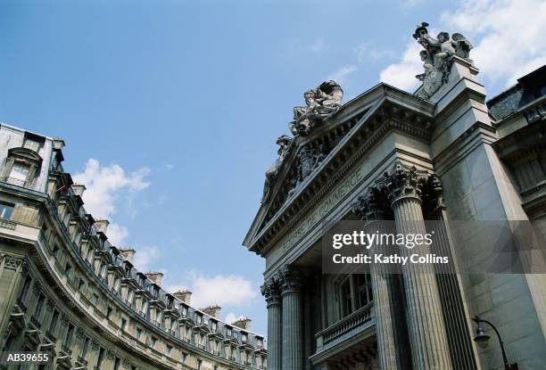 france, paris, exterior of la bourse de commerce, low angle view - bourse de paris photos et images de collection