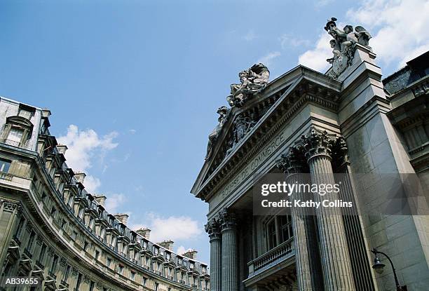 france, paris, exterior of la bourse de commerce, low angle view - bourse stock pictures, royalty-free photos & images