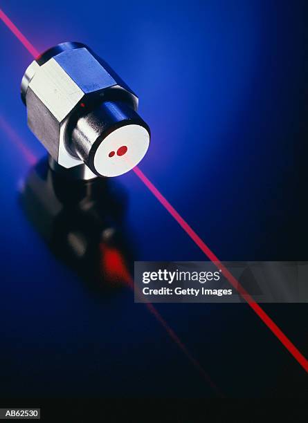 machine shooting laser beam - laser stockfoto's en -beelden