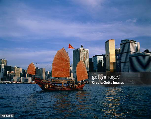 chinese sailing junk in harbor, hong kong, china - junk ストックフォトと画像