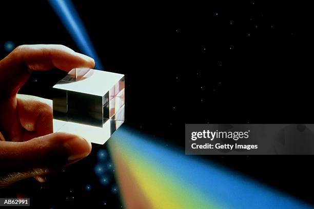 hand holding prism - prisma stockfoto's en -beelden