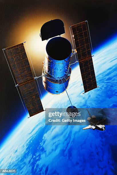 telescope with space shuttle over planet earth, view from space - space shuttle foto e immagini stock