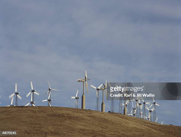 wind turbines on hill - jill stock pictures, royalty-free photos & images