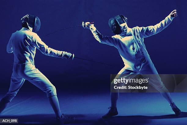 two men fencing - fäktningsmask bildbanksfoton och bilder