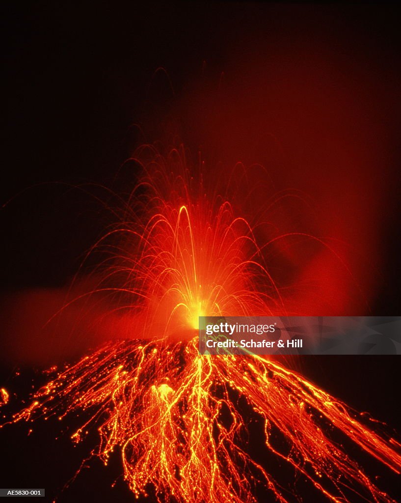 Costa Rica, Arenal Volcano erupting at night