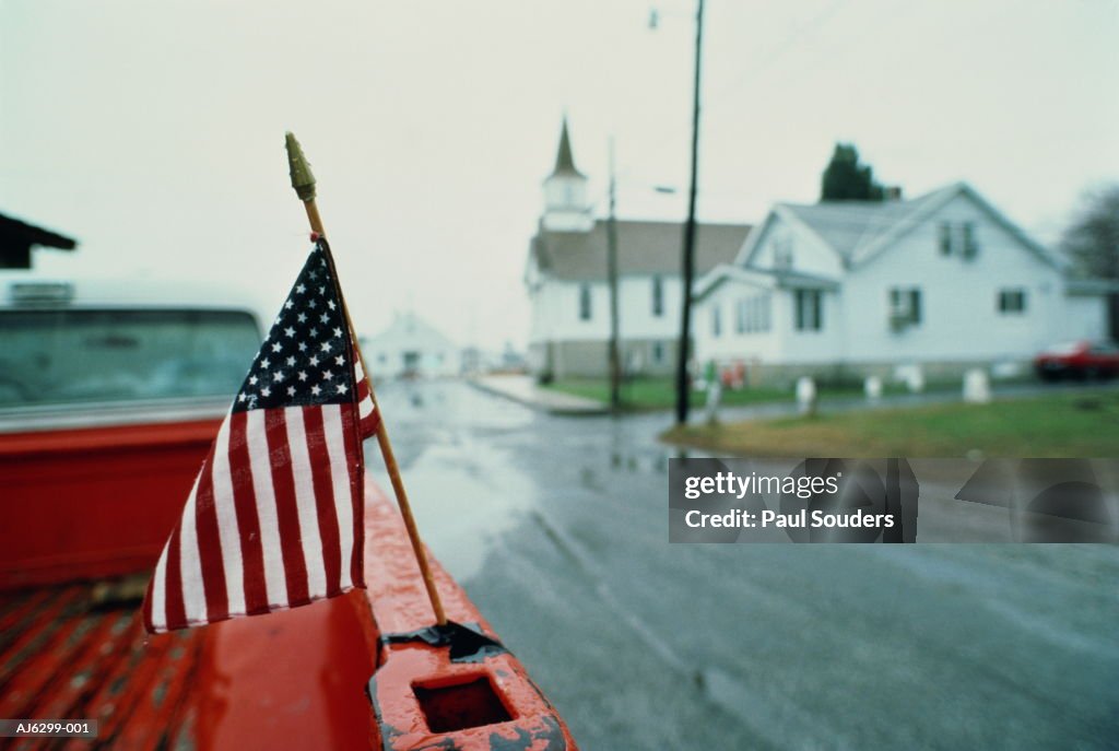 Stars and Stripes on back of pickup truck, USA