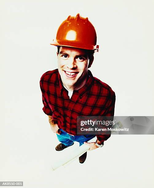 building contractor wearing hardhat, portrait, elevated view - builder standing isolated stock-fotos und bilder