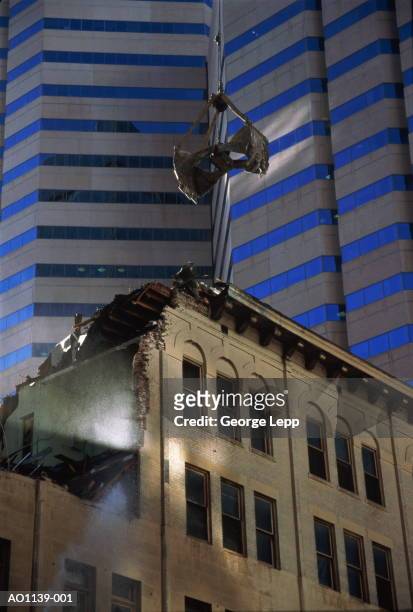 ageing building being demolished, below modern skyscraper, usa - denver housing stock pictures, royalty-free photos & images