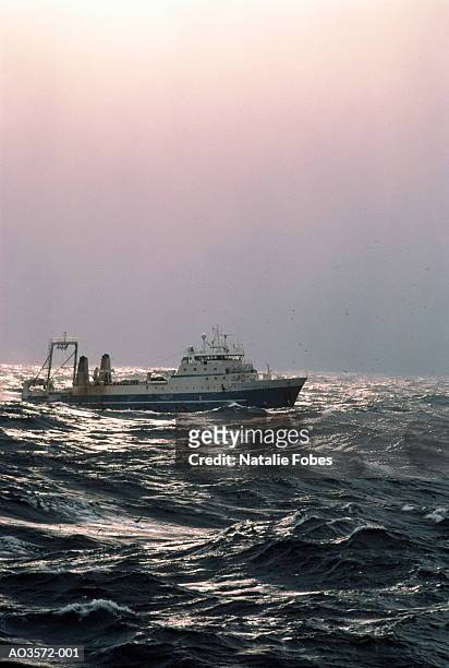 factory trawler on stormy bering sea, alaska, usa - bering sea stock pictures, royalty-free photos & images