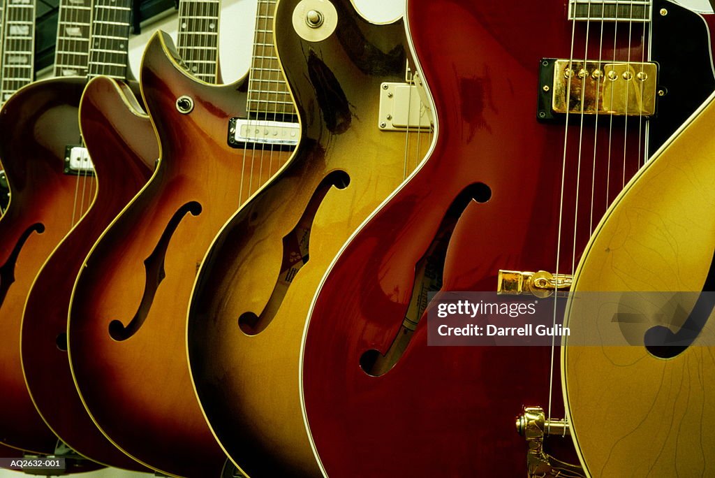 Guitars hanging on display, close-up