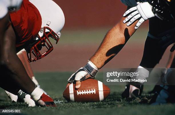 american college football, line of scrimmage, close up - football line of scrimmage stock pictures, royalty-free photos & images