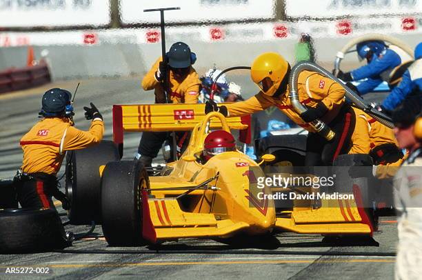 racing car in pit-stop, california, usa (digital enhancement) - pit stop stock pictures, royalty-free photos & images