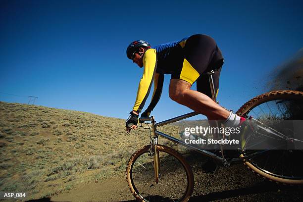 man riding downhill on mountain bike - southern european descent bildbanksfoton och bilder
